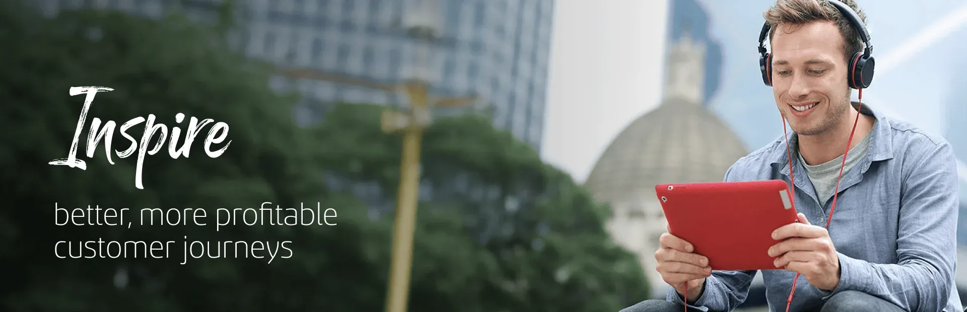 Man listening to music on his tablet