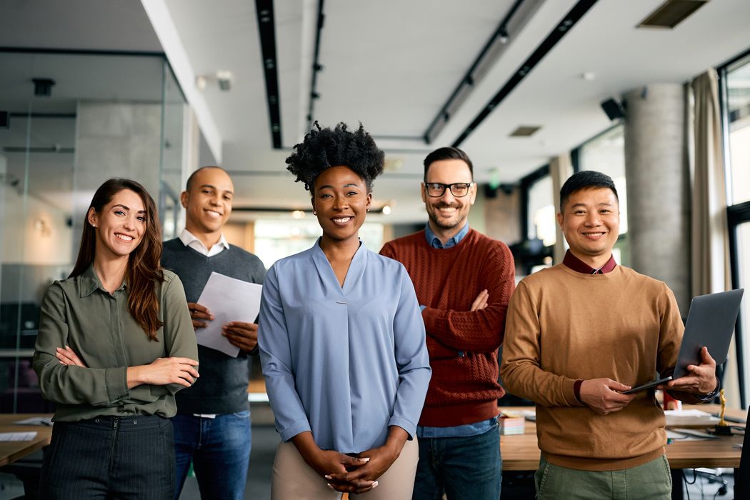 Diverse group of office workers on a modern meeting room