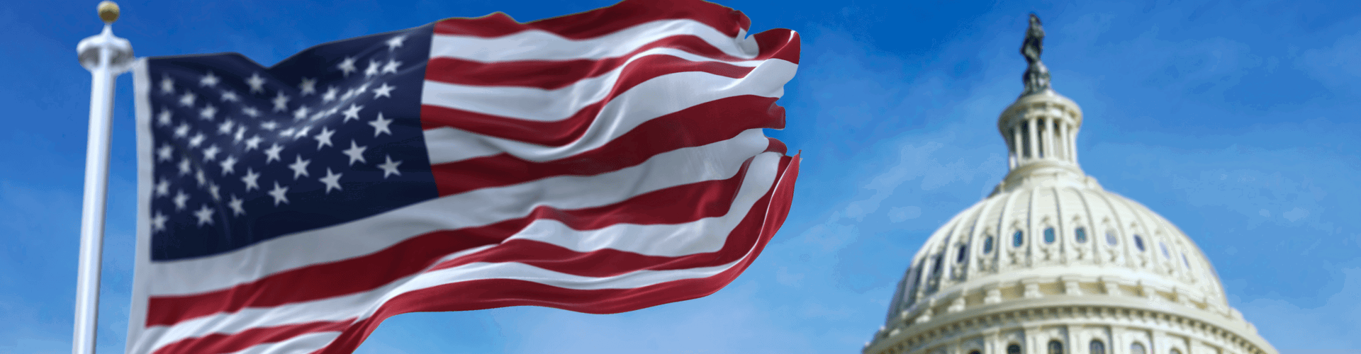 The U.S. Capitol dome with the American flag prominently displayed