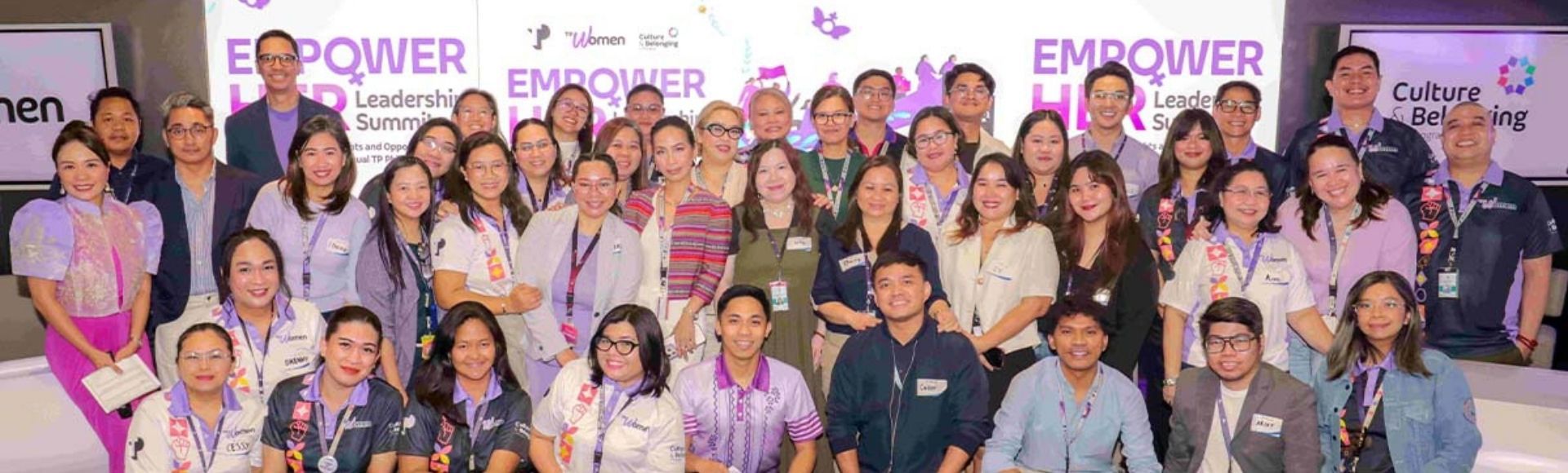 Group of TP Employees smiling after a Women's Leadership Summit event