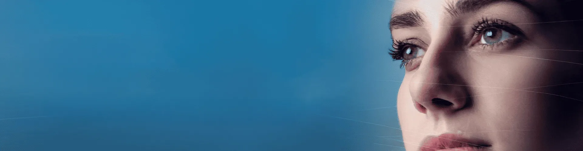 a close-up of a woman's face looking right; text reads, "unlock the power of agentic solutions" on a blue background.