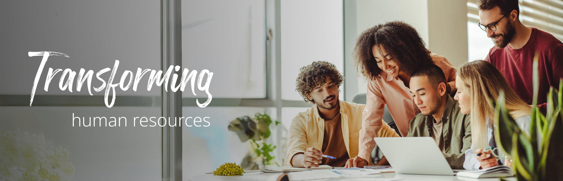 Group of employees having a meeting to discuss team strategies