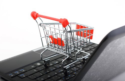Animated shopping trolley on a laptop