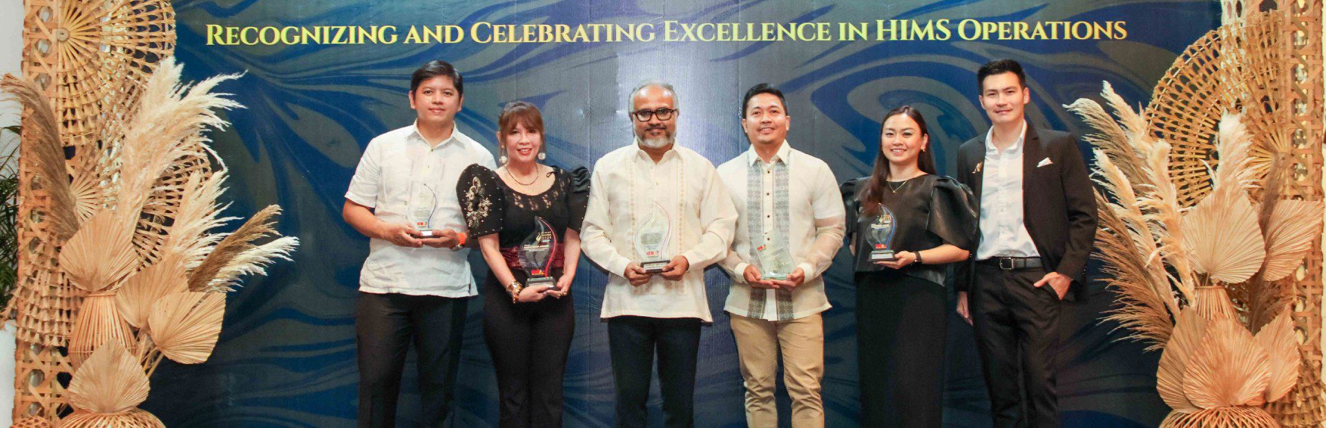 TP Philippines leaders representing the company at the HIMAP Awards 2025 ceremony.