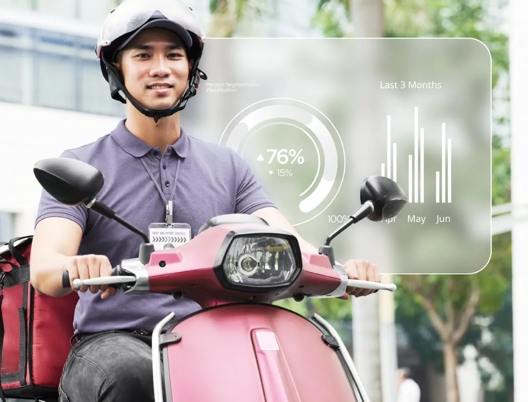 A delivery rider with performance data visualized in the background