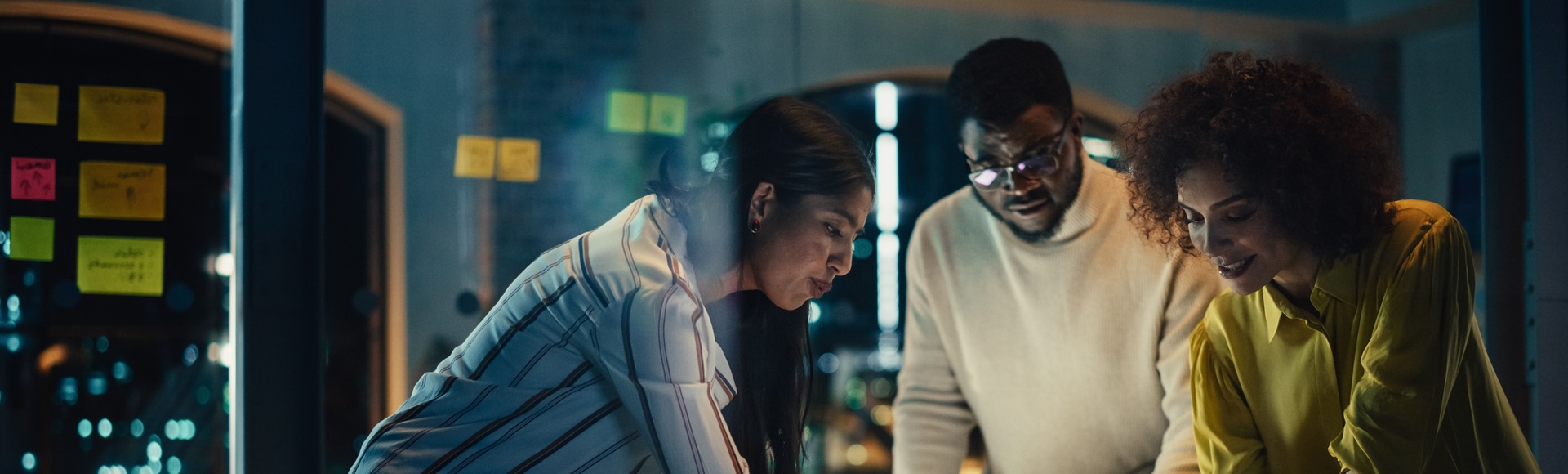 A group of three individuals working