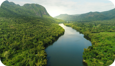 River passing through chains of green mountains