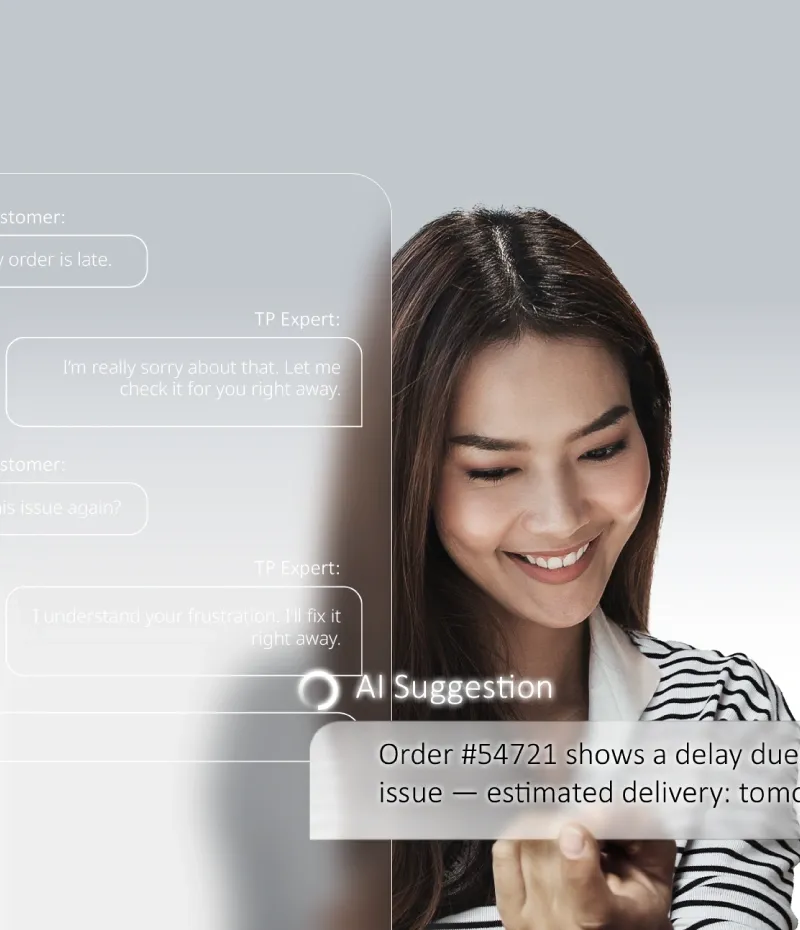 Woman engaging with a TP expert, illustrating Hybrid Force where AI and people collaborate.