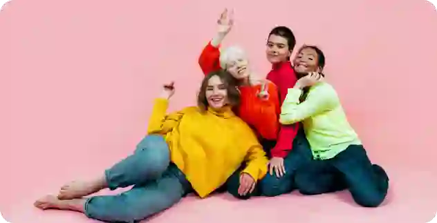 Diverse group of young women wearing colored clothes
