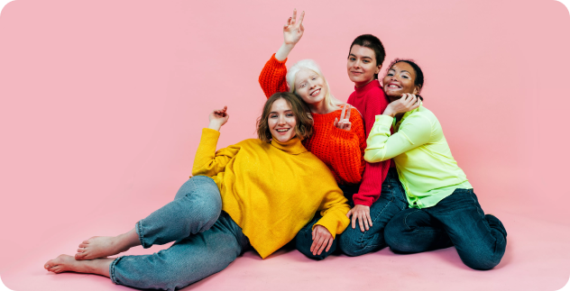 Diverse group of young women wearing colored clothes Diverse group of young women wearing colored clothes