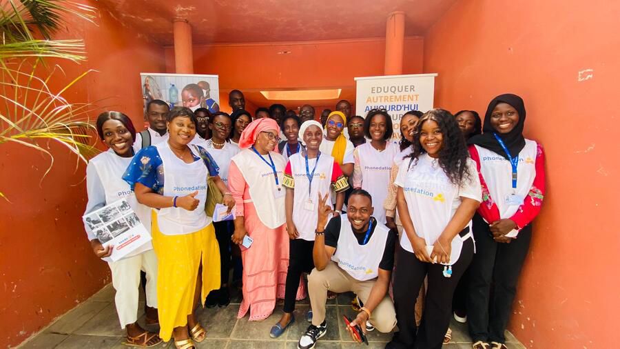 Group of volunteers smiling during a community initiative.