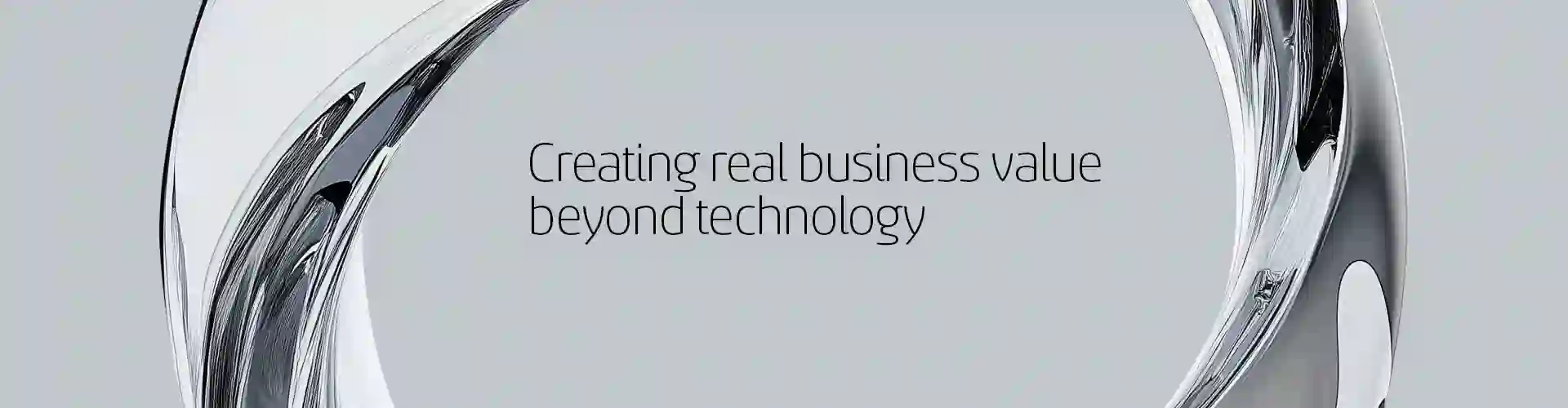 Abstract metallic ring structure surrounding the text 'Creating real business value beyond technology' on a light gray background.