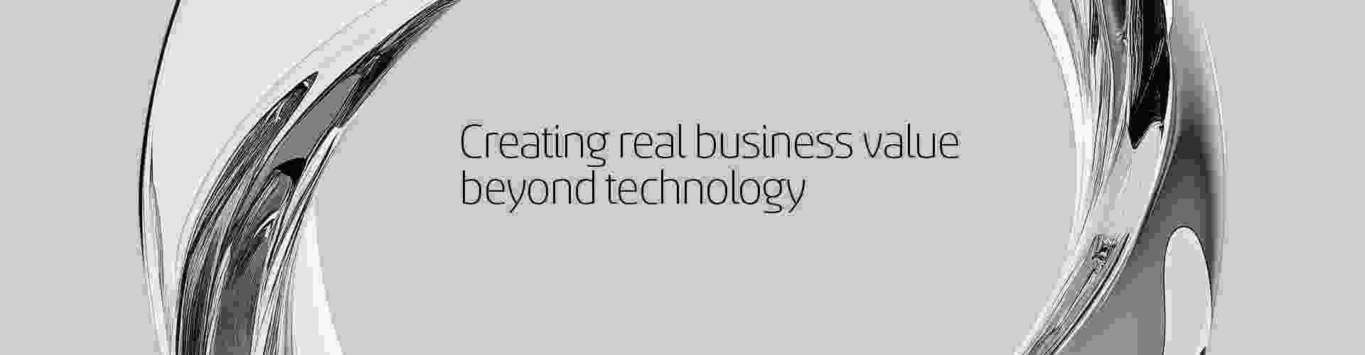Abstract metallic ring structure surrounding the text 'Creating real business value beyond technology' on a light gray background.