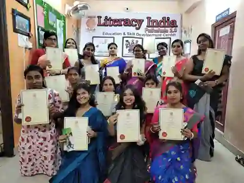 Diverse group of Indian women showing their certificates to the camera