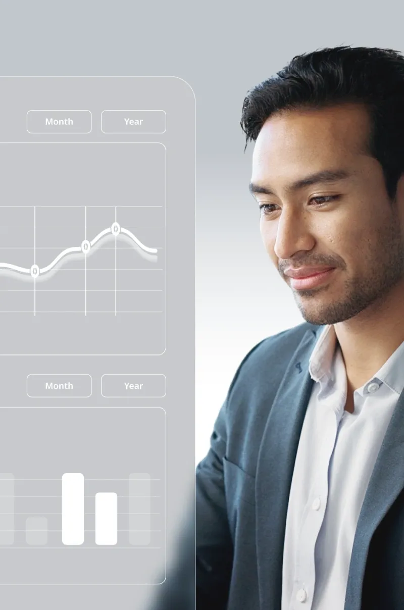 Asian businessman analyzing a modern dashboard, representing operational excellence.