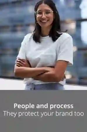 Smiling woman with arms crossed