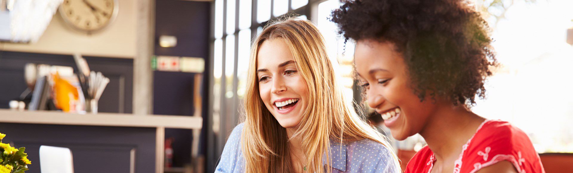 Smiling Women Working Together
