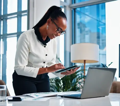 Professional woman analyzing business data in a modern office.