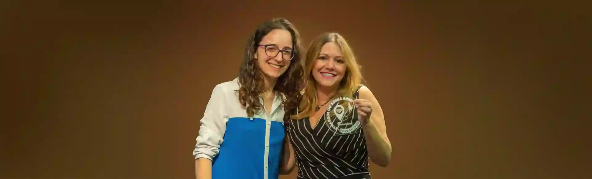 Women holding trophy