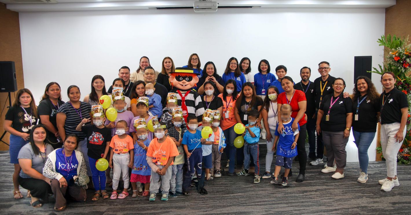 TP volunteers celebrate CSR event with children and community partners.