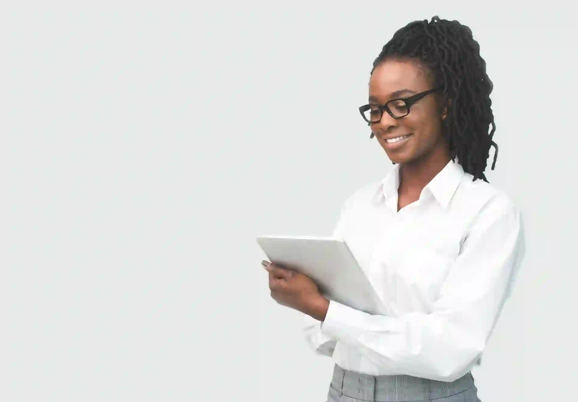 African business woman reading on a tablet