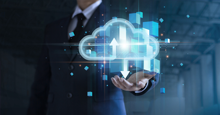 Business professional holding a digital hologram of a cloud with upload and download arrows.