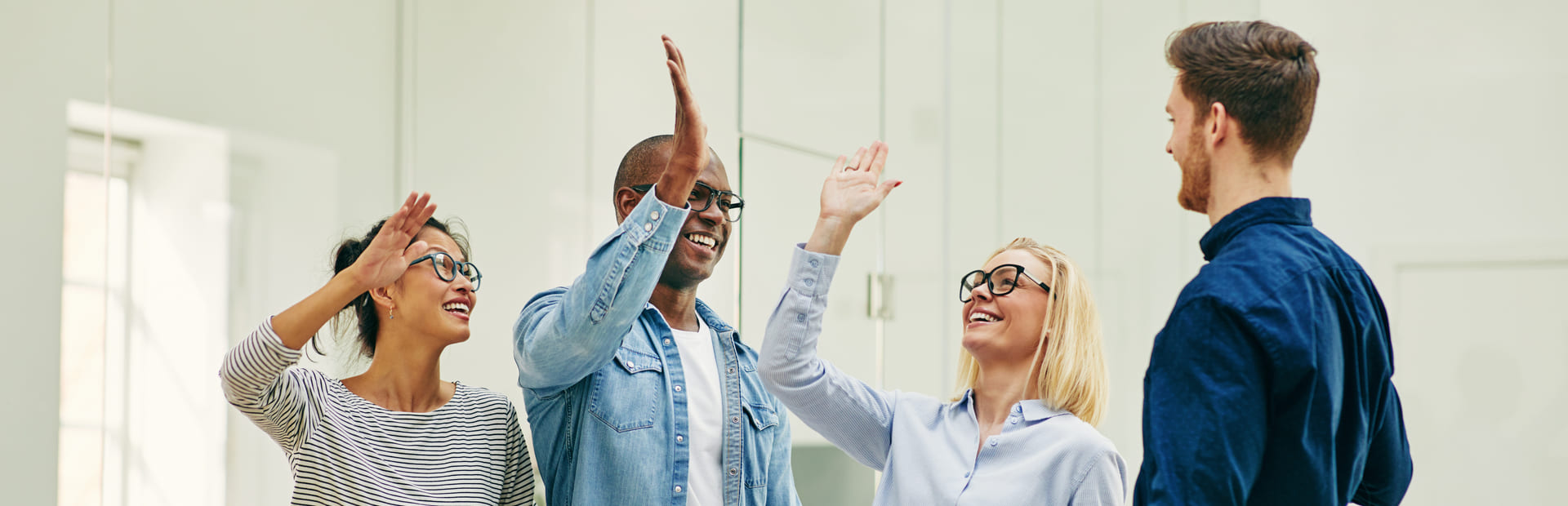 Team members celebrating a shared achievement, illustrating TP’s Top 10 World’s Best Workplaces 2025 ranking.