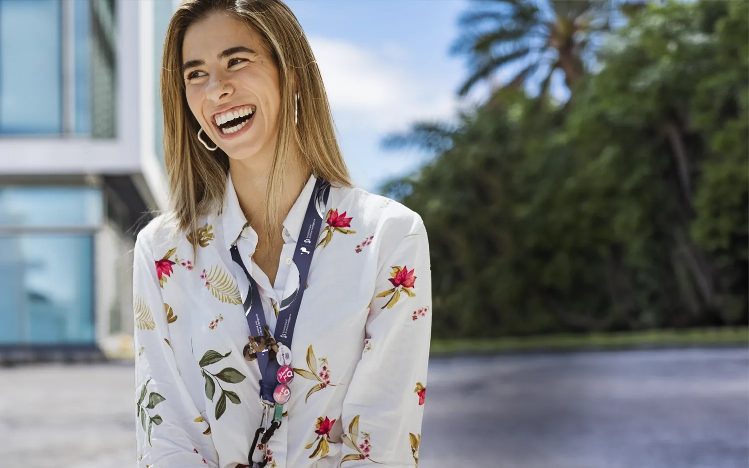 Happy TP employee smiling, reflecting pride in choosing the company.